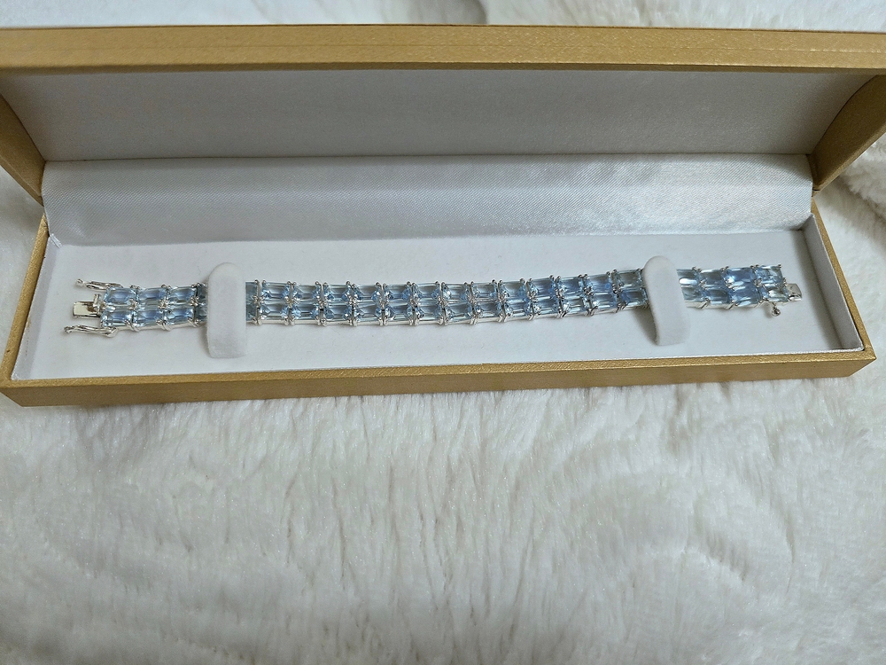 .925 Sterling Silver double row blue topaz bracelet